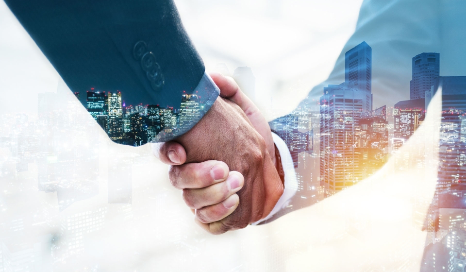 Welcome. double exposure of business man partner handshake with during sunrise and cityscape background, digital communication technology, investment, negotiation, partnership and teamwork concept