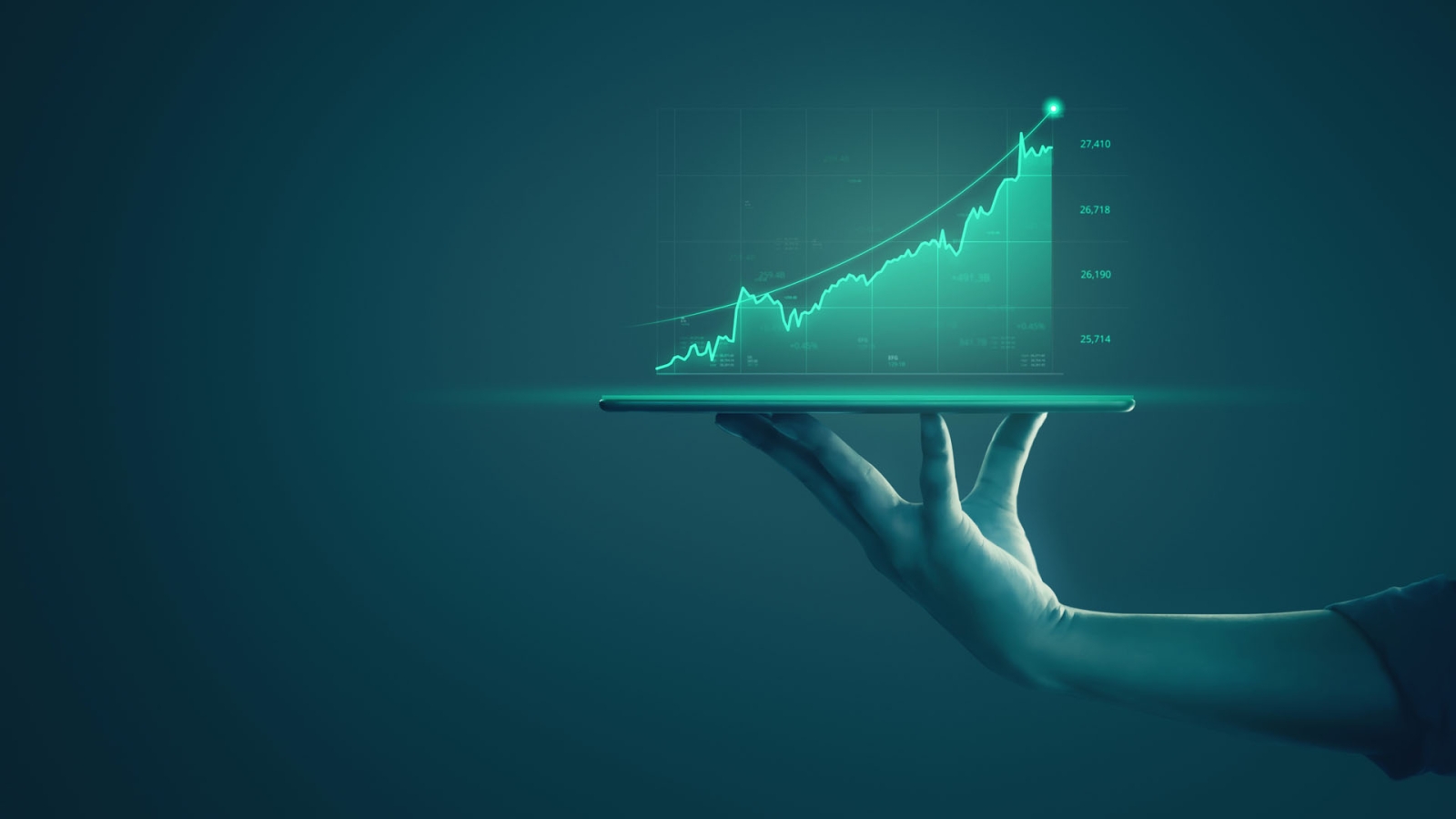 Businessman holding tablet and showing holographic graphs and stock market statistics gain profits. Concept of growth planning and business strategy. Display of good economy form digital screen.